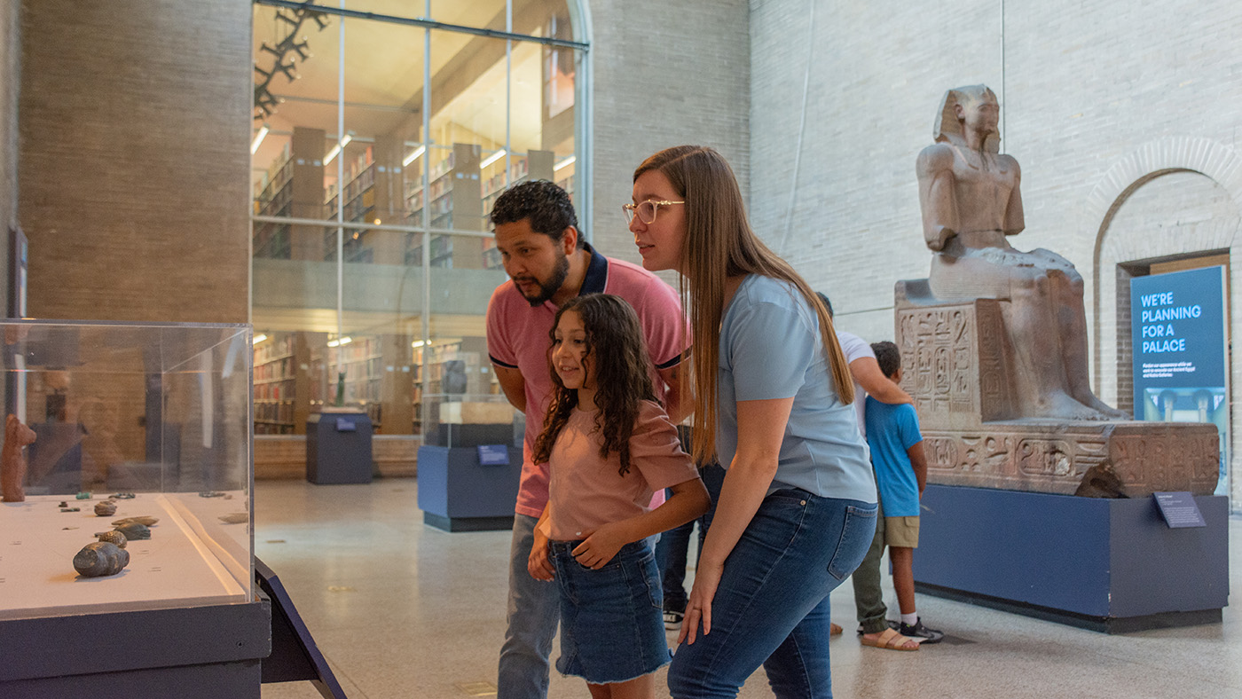 A family explores the Egypt Gallery before its closure on Nov. 6, 2023 for a monumental reimagining.